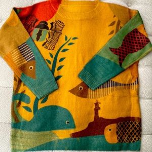 One size fits all sweater. Perfect with leggings. Never worn.